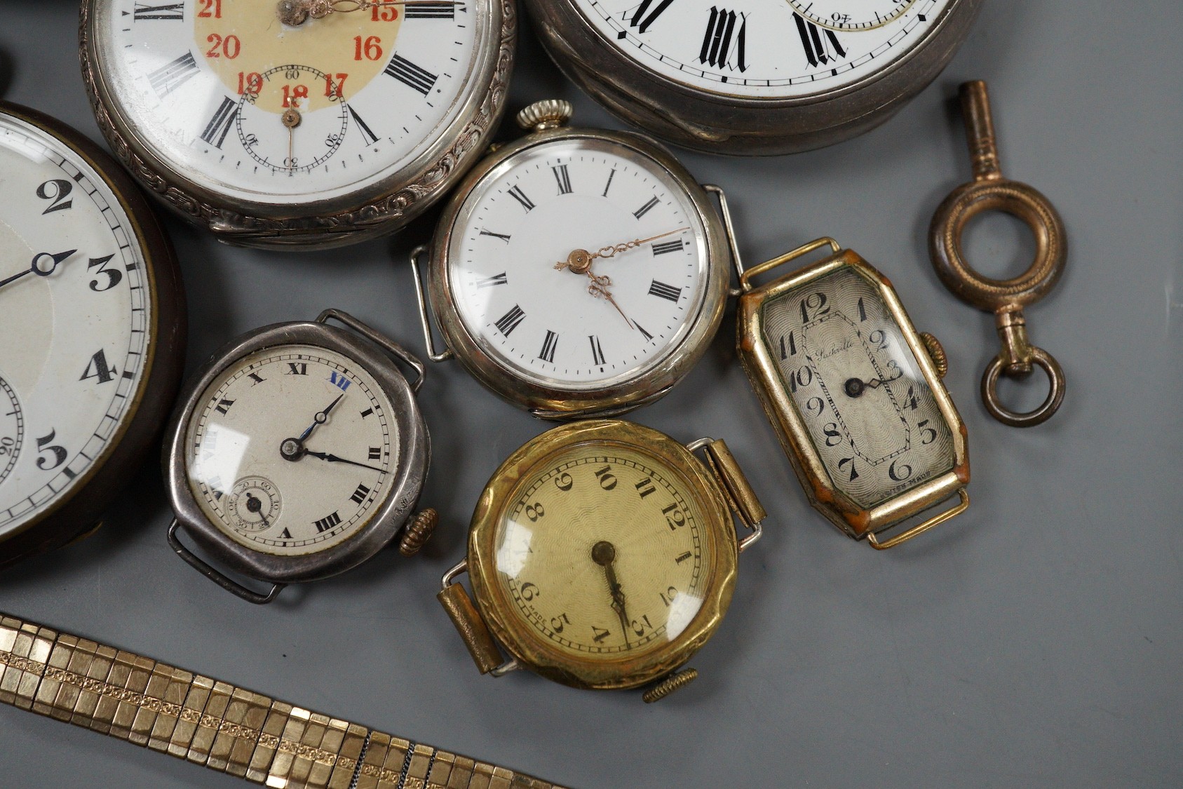 Two silver open faced pocket watches including Catesbys Ltd Record Lever, a German 800 pocket watch, two other base metal pocket watches, four assorted wrist watches and a gilt metal watch bracelet.